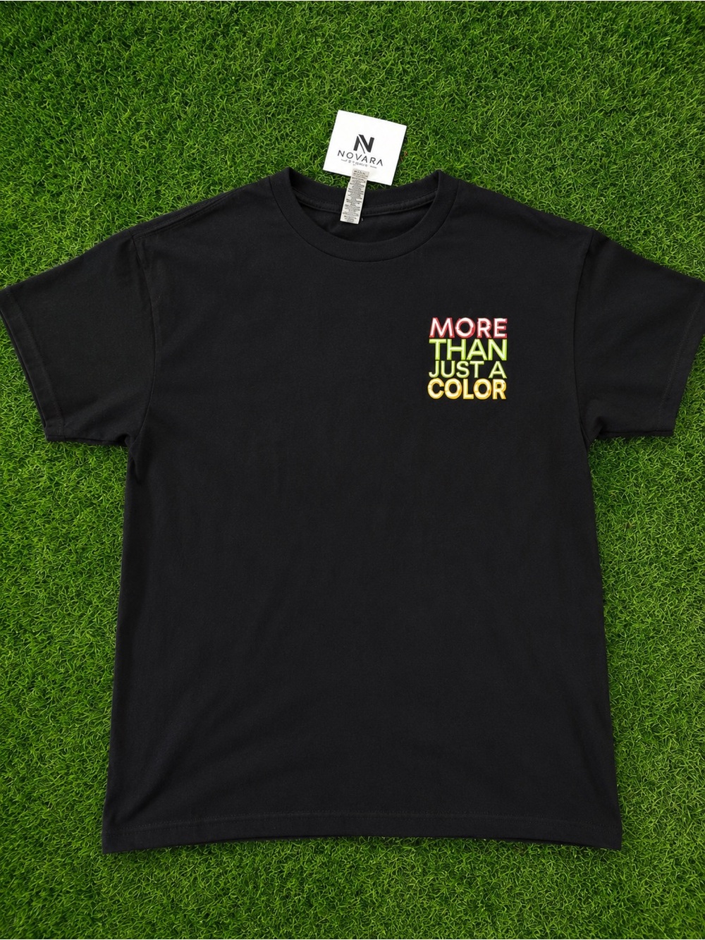 Novara Black Tee with Multicolor "More Than Just A Color" Print